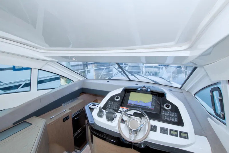 Gail Force Yacht Photos Pics 2019 Beneteau Gran Turismo 50 yacht cockpit with modern navigation system and sleek design.