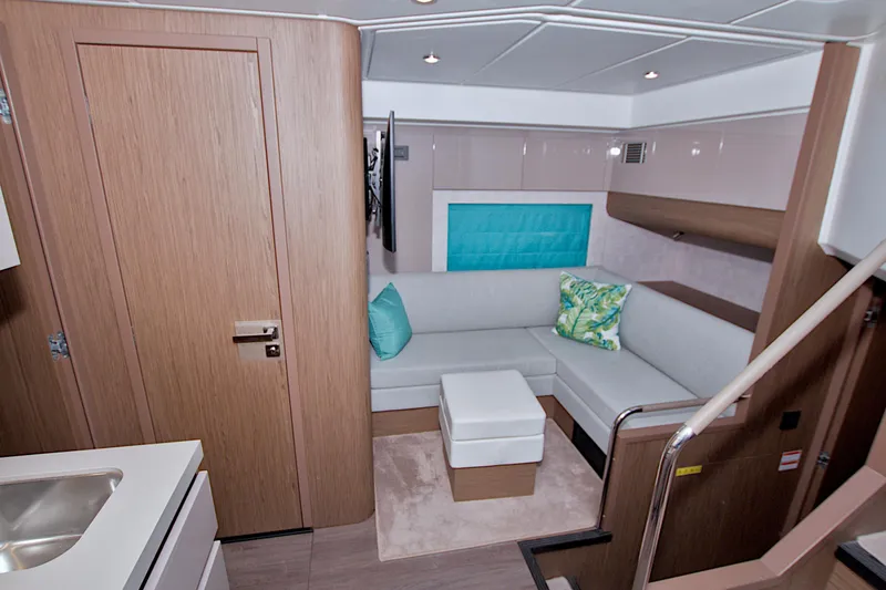 Gail Force Yacht Photos Pics Luxurious interior of 2019 Beneteau Gran Turismo 50 yacht with modern seating and decor.