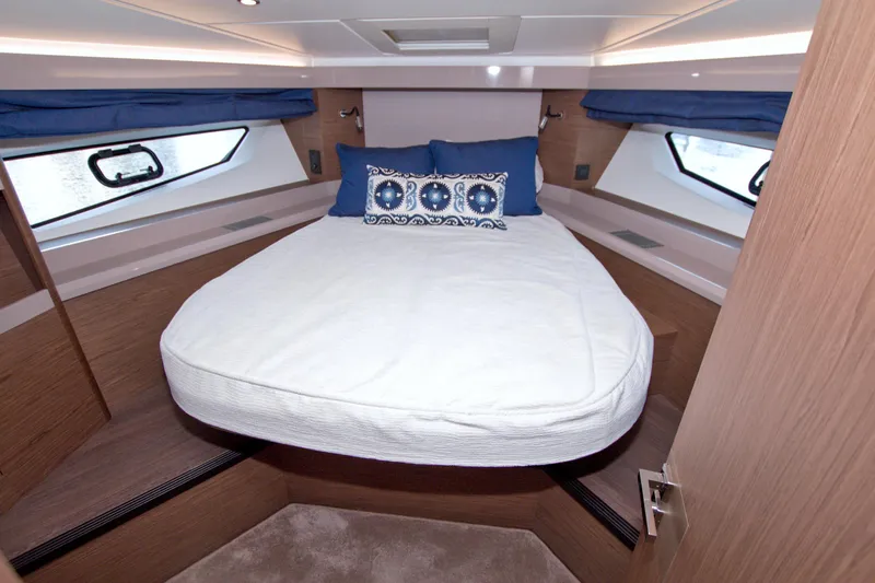 Gail Force Yacht Photos Pics Luxurious cabin interior of 2019 Beneteau Gran Turismo 50 yacht with cozy bedding.