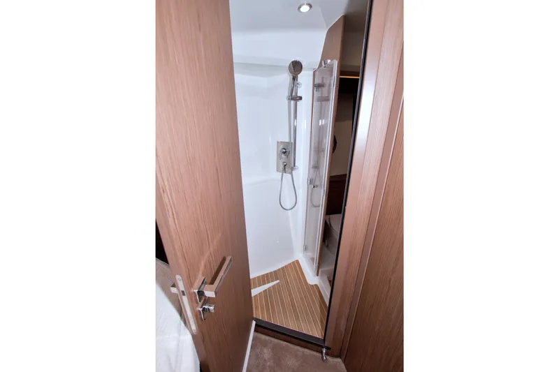 Gail Force Yacht Photos Pics 2019 Beneteau Gran Turismo 50 yacht shower with modern fixtures and wooden accents.