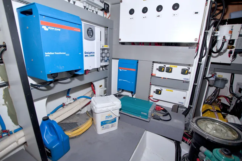 Gail Force Yacht Photos Pics Electrical system of a 2019 Beneteau Gran Turismo 50 yacht, featuring transformers and control panels.