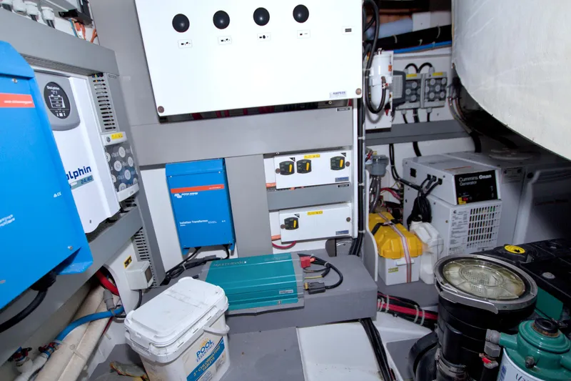 Gail Force Yacht Photos Pics Engine room of 2019 Beneteau Gran Turismo 50 with electrical equipment and generator.