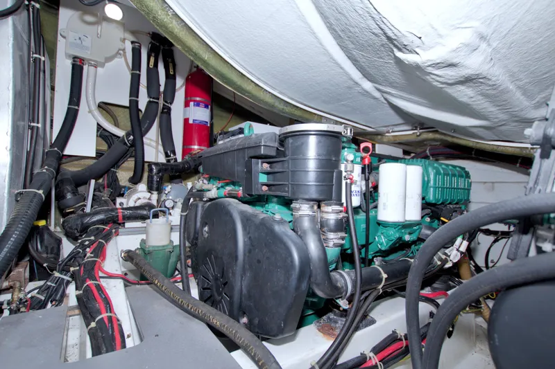 Gail Force Yacht Photos Pics Engine room of 2019 Beneteau Gran Turismo 50 yacht, showcasing mechanical components and wiring.