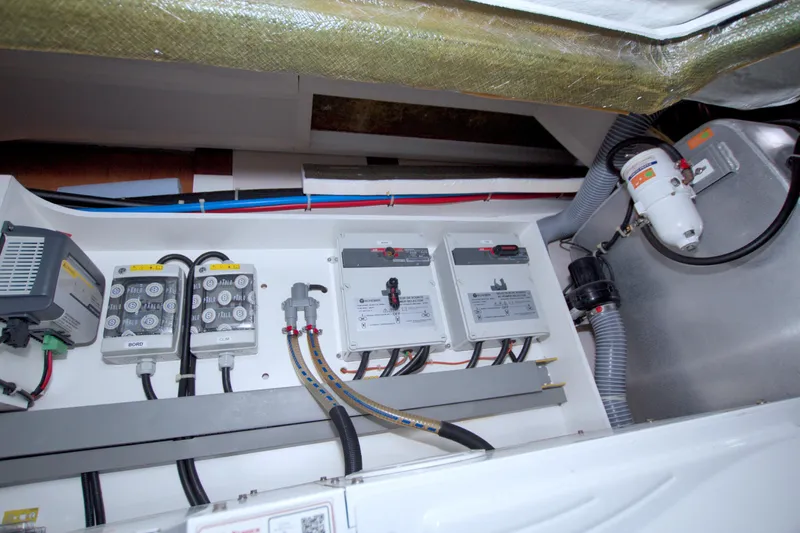 Gail Force Yacht Photos Pics Electrical system of 2019 Beneteau Gran Turismo 50 yacht, featuring control panels and wiring.