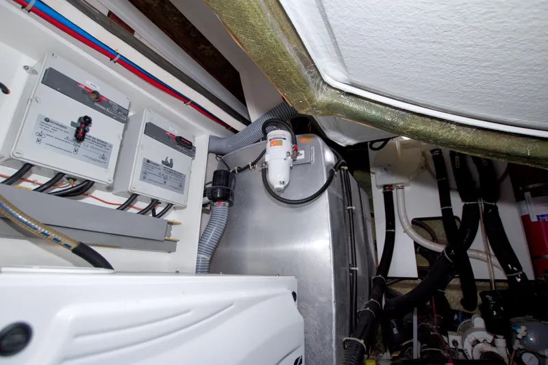 Gail Force Yacht Photos Pics Engine room of 2019 Beneteau Gran Turismo 50 yacht, showcasing electrical systems and components.