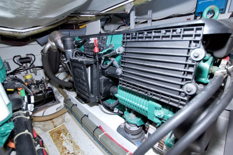 Gail Force Yacht Photos Pics Engine room of 2019 Beneteau Gran Turismo 50 yacht, showcasing mechanical components.