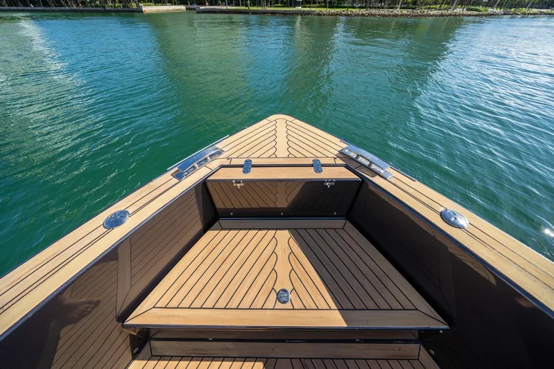 Morgan 1 Yacht Photos Pics Bow view of 2023 Pardo Yachts 43 with sleek teak decking on calm water.