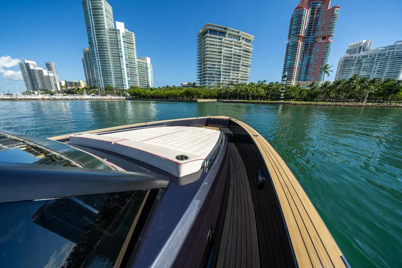 Morgan 1 Yacht Photos Pics 2023 Pardo Yachts 43 cruising near modern city skyline and waterfront.