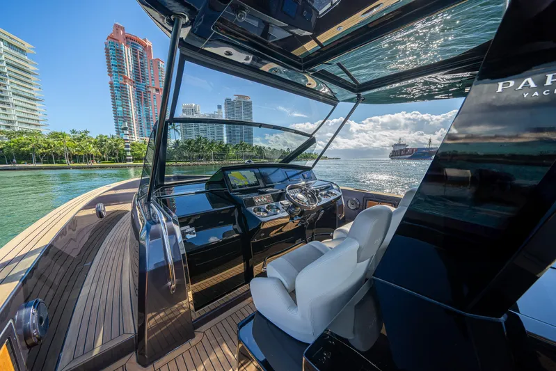 Morgan 1 Yacht Photos Pics 2023 Pardo Yachts 43 interior with modern helm, cityscape, and ocean view.