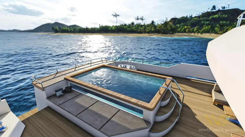 Project Artemis Yacht Photos Pics Luxurious yacht deck with pool, ocean view, and island backdrop, Custom Project Artemis 2026.