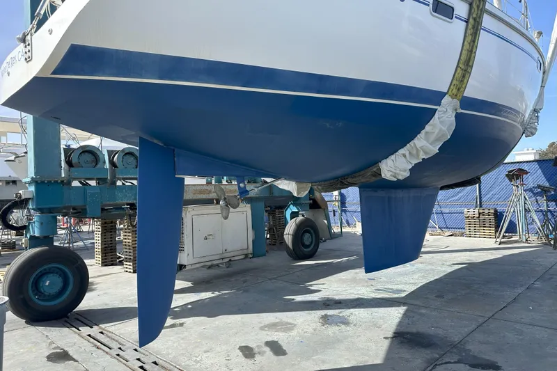 Take Five Yacht Photos Pics 1999 Catalina 42 MkII sailboat in dry dock, showing keel and rudder.