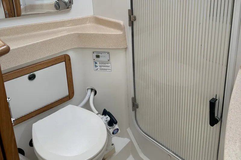 Take Five Yacht Photos Pics Bathroom interior of 1999 Catalina 42 MkII sailboat with toilet and shower.