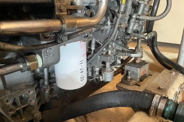 Perseus Yacht Photos Pics Engine components of a 2008 Mainship 34 Trawler Hardtop, showcasing intricate mechanical details.