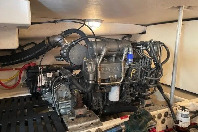 Perseus Yacht Photos Pics Engine room of 2008 Mainship 34 Trawler Hardtop, showcasing detailed mechanical components.