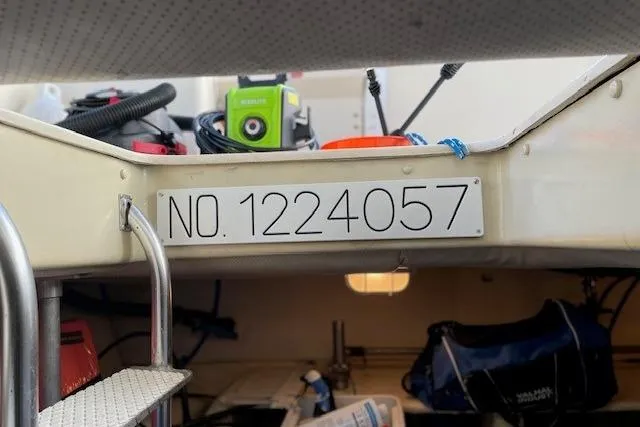 Perseus Yacht Photos Pics 2008 Mainship 34 Trawler Hardtop interior with registration number 1224057 visible.