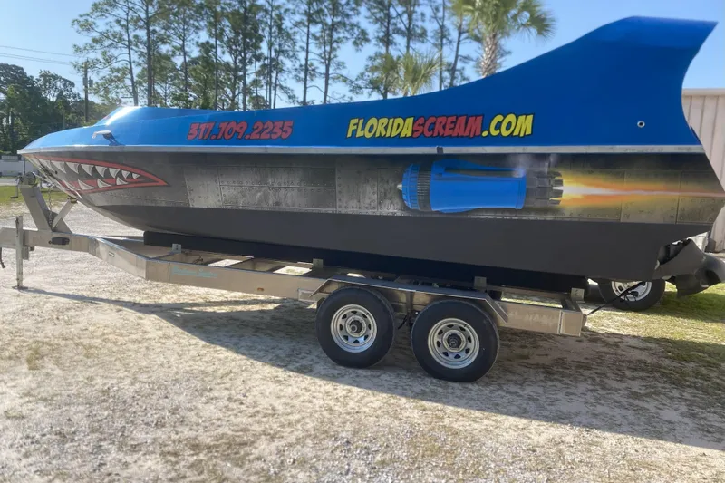  Yacht Photos Pics 2022 Smoky Mountain 16 Passenger boat with shark design on trailer, FloridaScream.com branding.