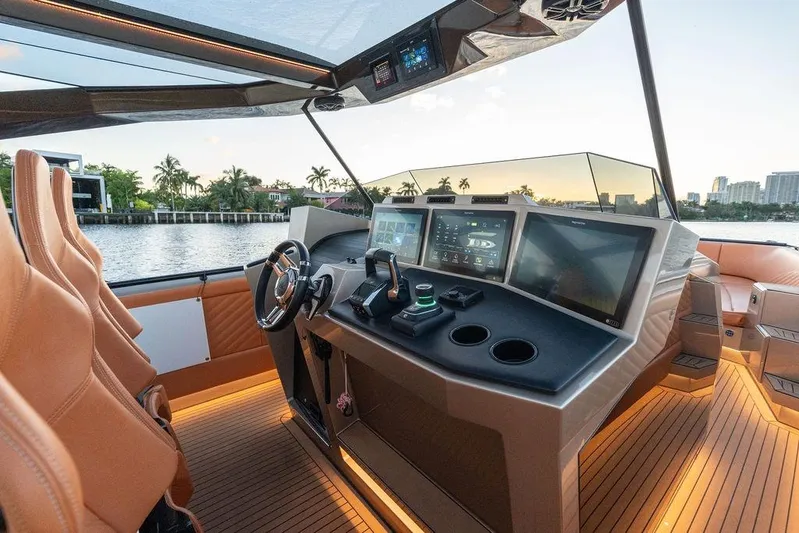  Yacht Photos Pics Luxurious 2023 DeKoning 43 yacht interior with advanced navigation system and leather seating.