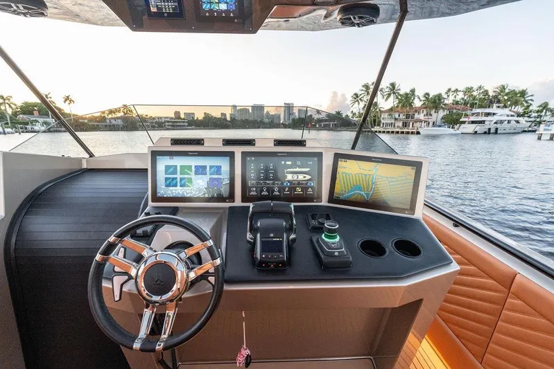  Yacht Photos Pics Helm of 2023 DeKoning 43 yacht with advanced navigation displays and luxurious interior.