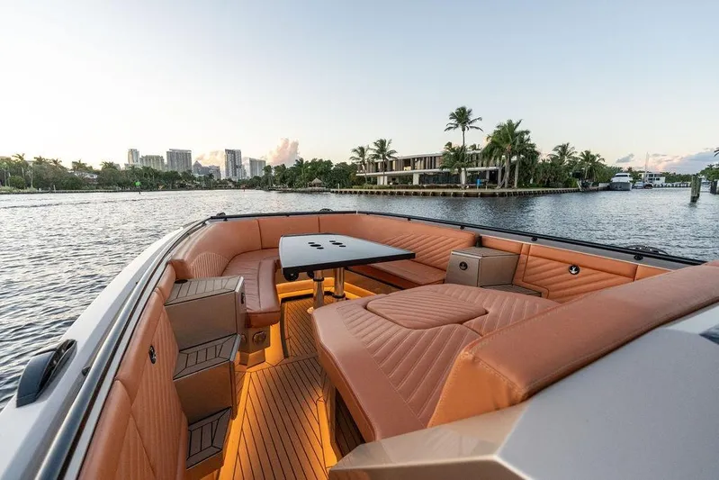  Yacht Photos Pics Luxurious 2023 DeKoning 43 boat interior with elegant seating and waterfront view.