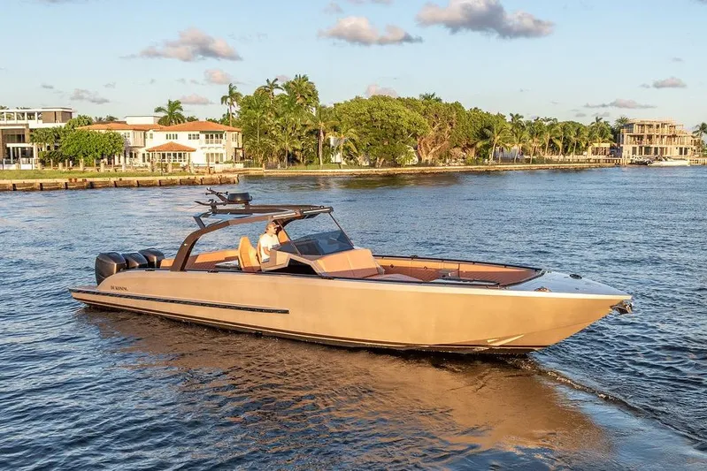  Yacht Photos Pics Luxury DeKoning 43 yacht cruising on a sunny day, 2023 model.