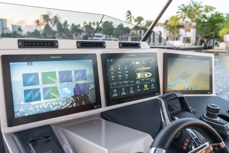  Yacht Photos Pics Modern DeKoning 43 yacht dashboard with advanced navigation screens, 2023 model.