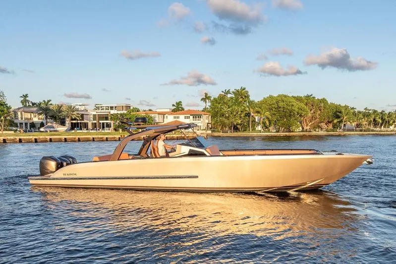  Yacht Photos Pics Luxury DeKoning 43 boat cruising on a sunny day, 2023 model.