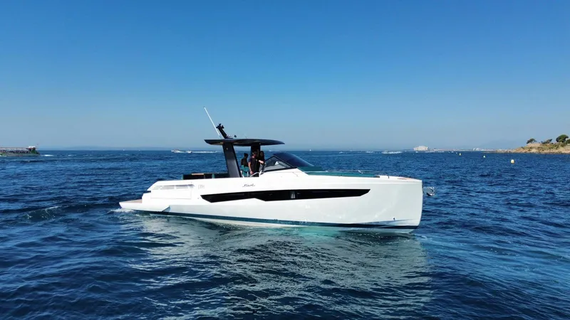 Fiart 39 Sw Yacht Photos Pics 2024 Fiart 39 Seawalker yacht cruising on open blue sea.