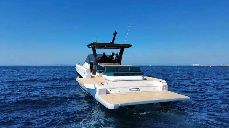 Fiart 39 Sw Yacht Photos Pics 2024 Fiart 39 Seawalker yacht cruising on open sea under clear blue sky.