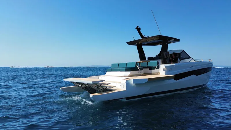 Fiart 39 Sw Yacht Photos Pics 2024 Fiart 39 Seawalker yacht cruising on open water under clear blue sky.