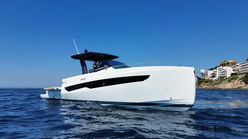 Fiart 39 Sw Yacht Photos Pics 2024 Fiart 39 Seawalker yacht cruising on open water under clear blue sky.