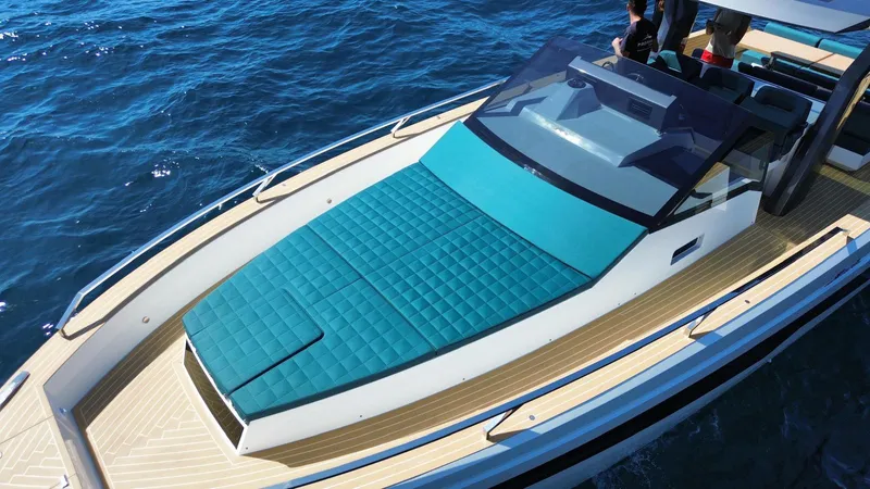 Fiart 39 Sw Yacht Photos Pics 2024 Fiart 39 Seawalker yacht with turquoise sunbed on open water.