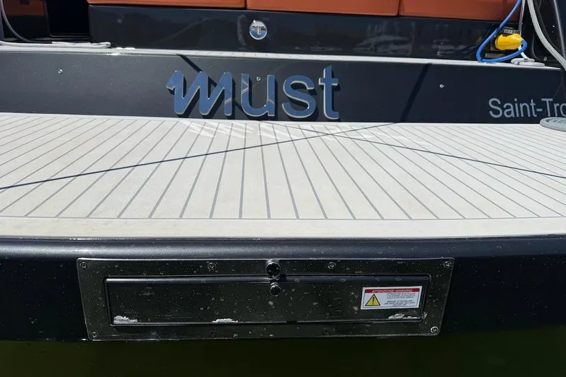 Must Yacht Photos Pics 2024 VanDutch 40 yacht deck with "Must" branding, Saint-Tropez location.