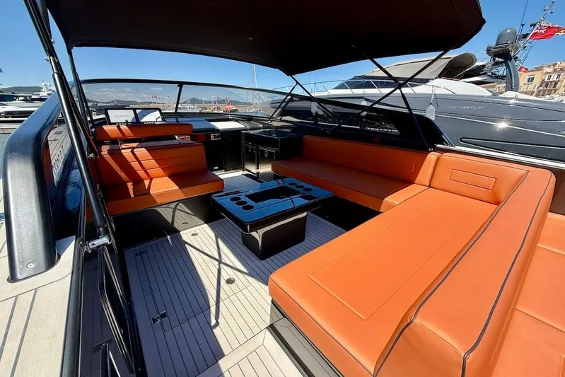 Must Yacht Photos Pics 2024 VanDutch 40 yacht interior with orange seating and sleek design.