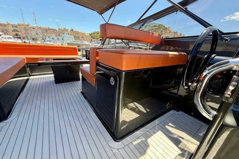 Must Yacht Photos Pics Luxurious interior of 2024 VanDutch 40 yacht with sleek seating and modern design.