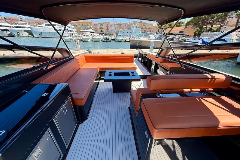 Must Yacht Photos Pics Luxurious 2024 VanDutch 40 yacht interior with sleek seating and modern design at a marina.