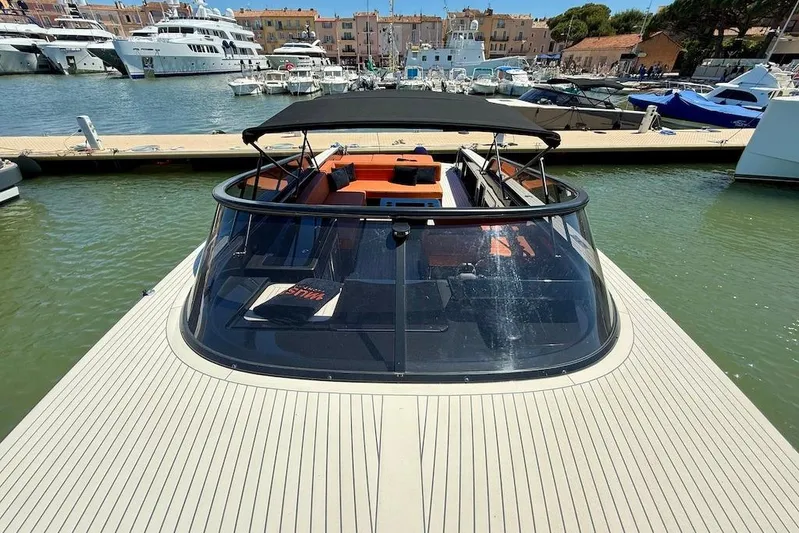 Must Yacht Photos Pics 2024 VanDutch 40 yacht docked in a marina, showcasing sleek design and luxury features.