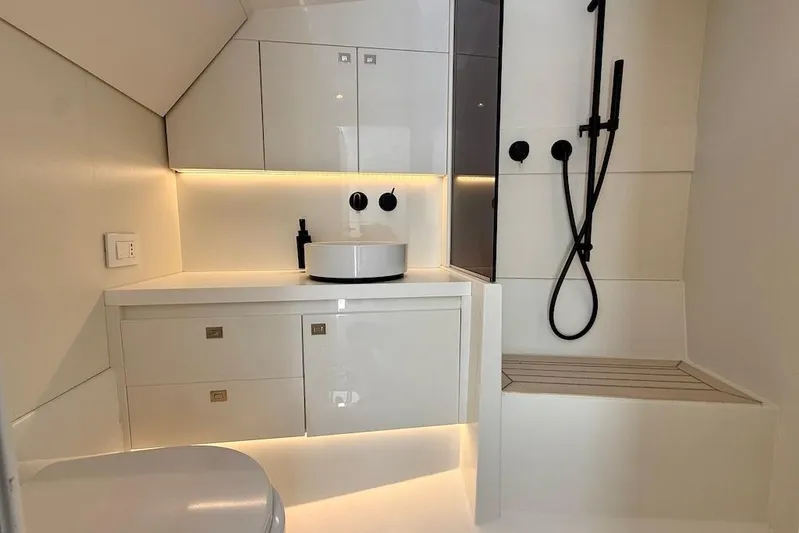 Must Yacht Photos Pics Luxurious 2024 VanDutch 40 yacht bathroom with modern fixtures and sleek design.