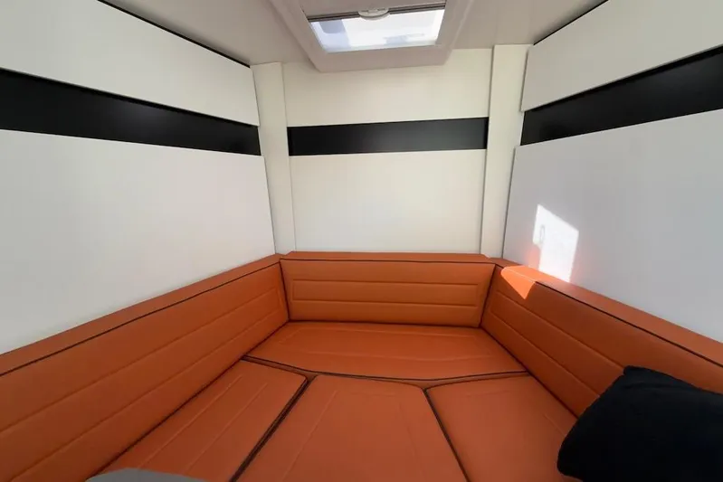 Must Yacht Photos Pics 2024 VanDutch 40 interior with orange seating and modern design elements.