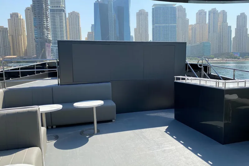  Yacht Photos Pics Luxurious Custom Yacht 125 deck with modern seating, city skyline view, built in 2002.