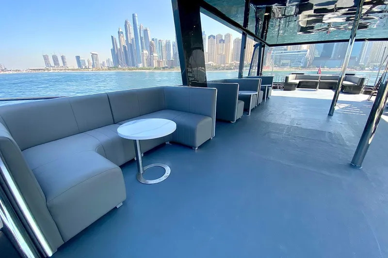  Yacht Photos Pics Luxurious Custom Yacht 125 interior with modern seating, city skyline view, 2002 model.