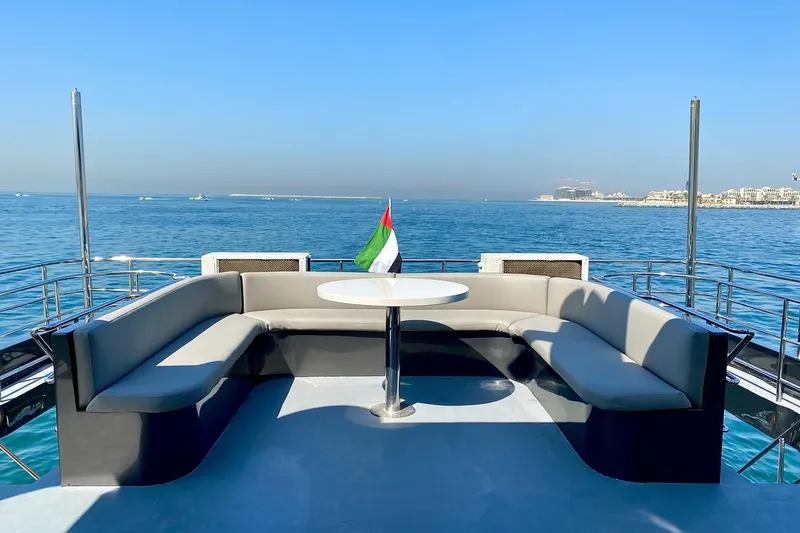  Yacht Photos Pics Luxurious Custom Yacht 125, 2002 model, with elegant seating and ocean view.