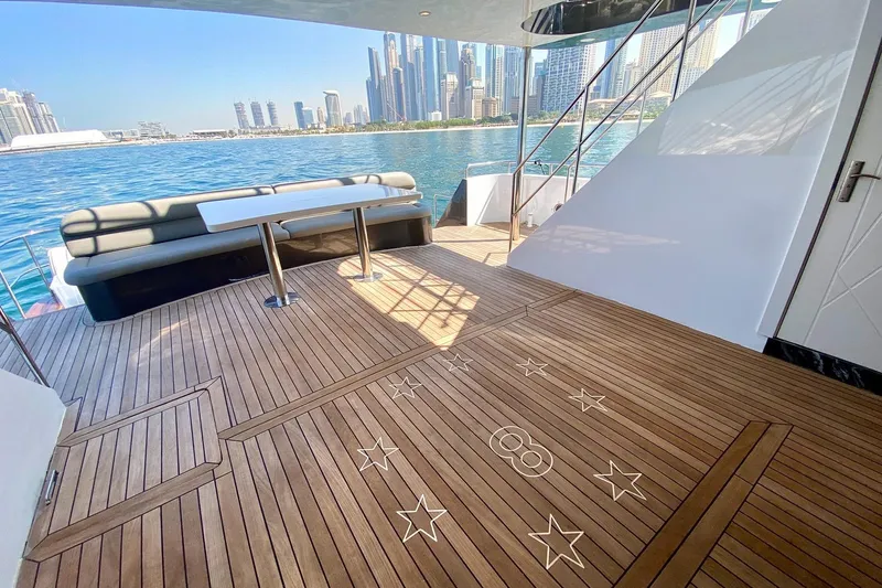  Yacht Photos Pics Luxurious Custom Yacht 125 deck with city skyline view, 2002 model.