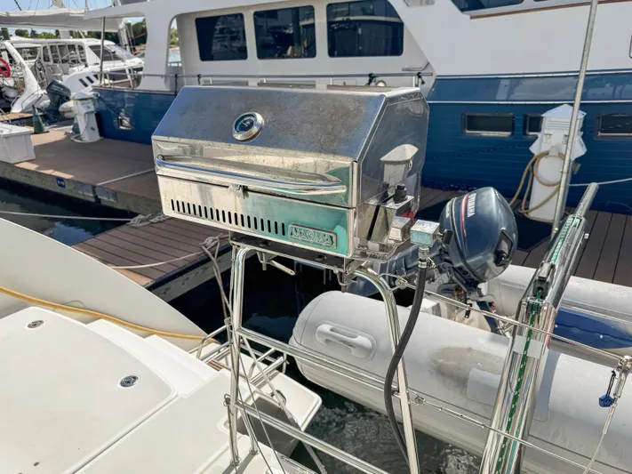 Sunshine Yacht Photos Pics Stainless steel grill on 2017 Lagoon 450 F yacht, docked at marina.