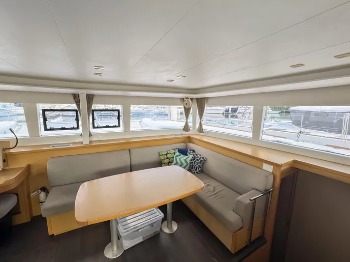 Sunshine Yacht Photos Pics Interior of 2017 Lagoon 450 F catamaran with spacious seating and large windows.
