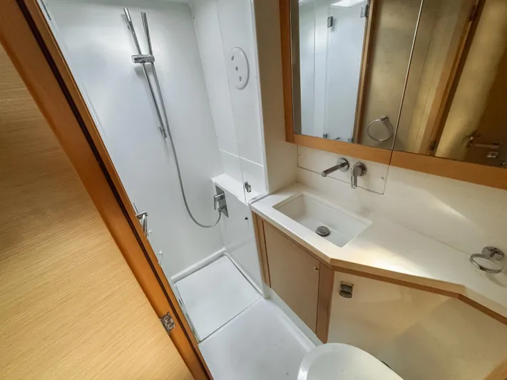 Sunshine Yacht Photos Pics Modern bathroom in 2017 Lagoon 450 F yacht with shower and sink.