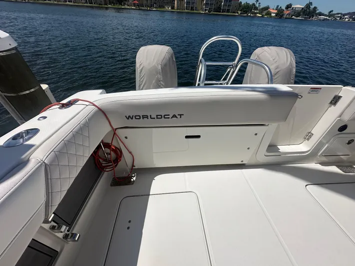  Yacht Photos Pics 2024 World Cat 280ccx boat interior with white seating and water view.