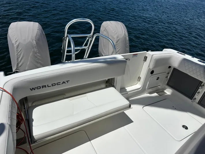  Yacht Photos Pics 2024 World Cat 280ccx boat interior with seating and ocean view.