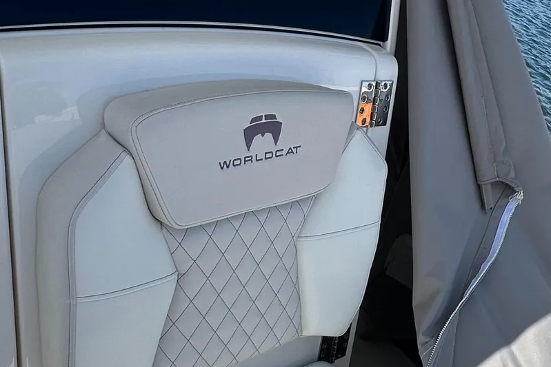  Yacht Photos Pics 2024 World Cat 280ccx boat seat with logo, featuring diamond-patterned upholstery.