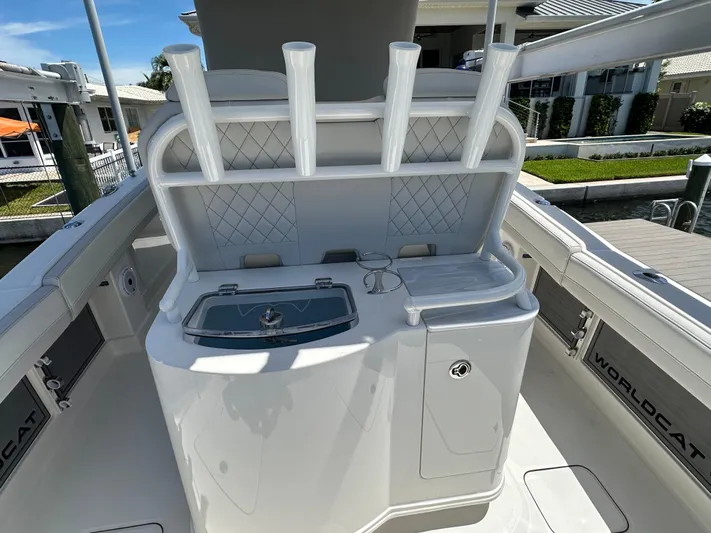  Yacht Photos Pics 2024 World Cat 280ccx boat interior with rod holders and storage compartments.