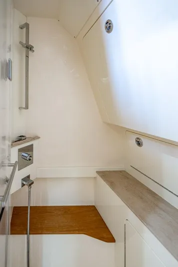  Yacht Photos Pics 2018 Scout 420 LXF boat interior with modern shower and storage.